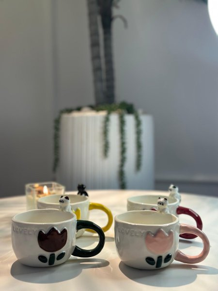 فنجان وردة مع دب