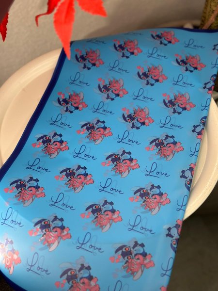 ورق تغليف هدايا ستيتش أزرق (ربطه 20 ورقه)