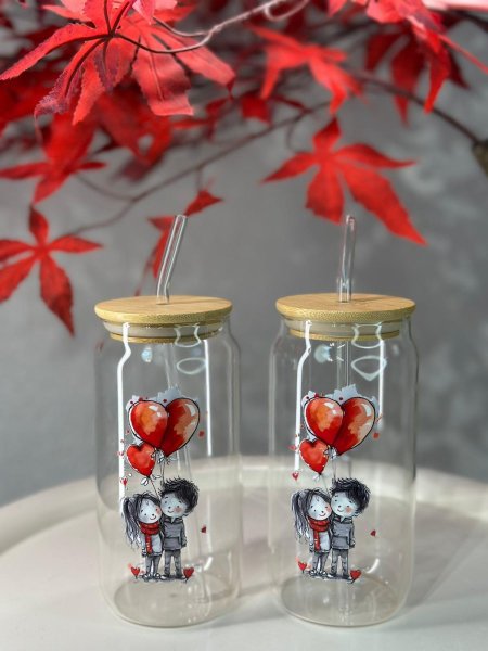 كاسة شفاف مع مصاصة ولد وبنت بلاليين احمر