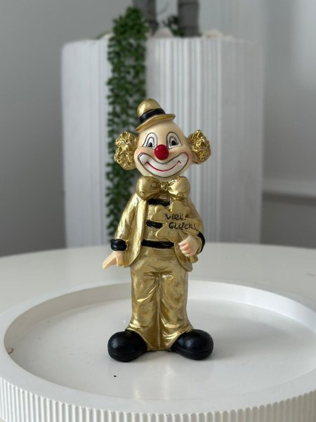 تحف مهرج حامل وردة