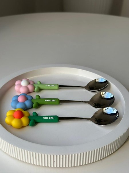 معالق وردة عباد الشمس