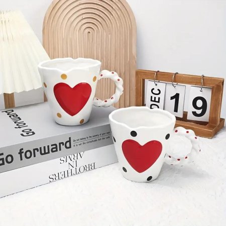 ماج قلب مع يد مجدول