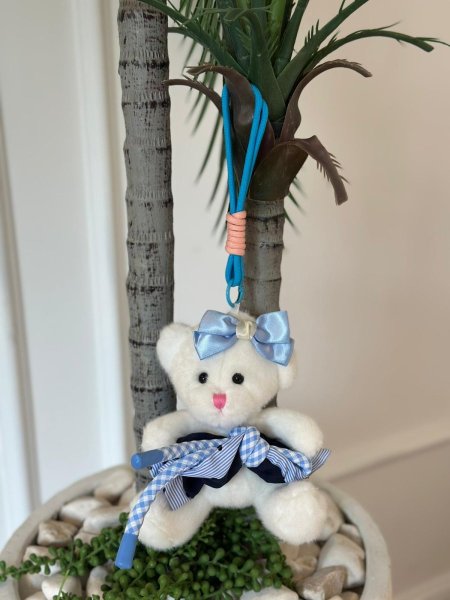 دب صغير حبيبات تعليقة (20سم) أبيض ببيونه