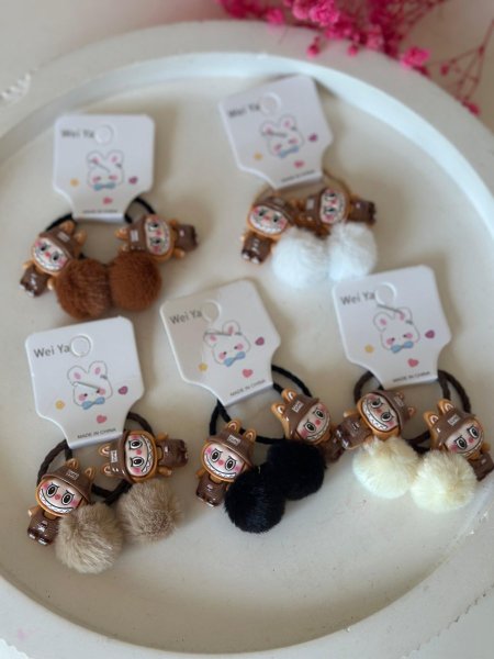 مغيط شعر لابوبو بني /سعر الكرت (15) عدد قطع 10 